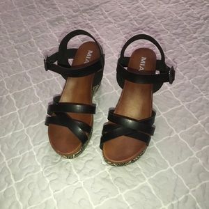 Black and brown wedge sandals
